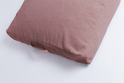 orthopädisches hundebett in rosa Teddyfell von der oben mit Haltegriff